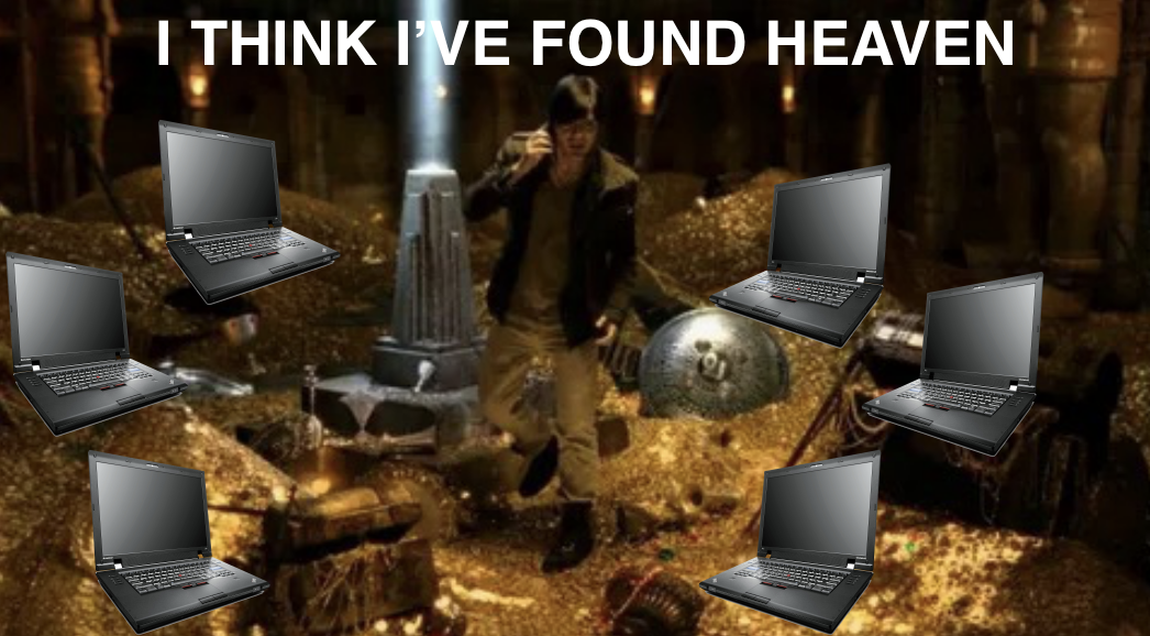 Guy in a room full of treasure with thinkpad laptops "I think I've found heaven"